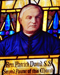 Stained glass window of Father Patrick Dowd